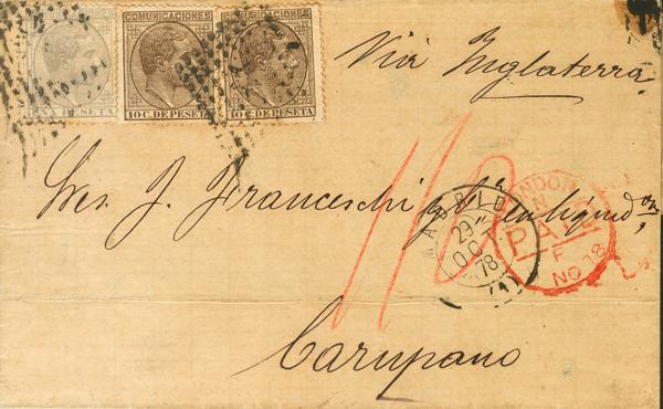 407 - <i class="far fa-envelope"></i>  192(2), 197. 1878. 10 cts castaño, dos sellos y 1 pts gris. MADRID a CARUPANO (VENEZUELA). Circulada vía Inglaterra con tarifa de 1´20 pts de Septiembre de 1878, al dorso viñeta de cierre (rotura) con imagen de Matías López, importante político y empresario de la industria chocolatera de Madrid. MAGNIFICA Y ESPECTACULAR CON EL USO DEL 1 PTS. - 425€